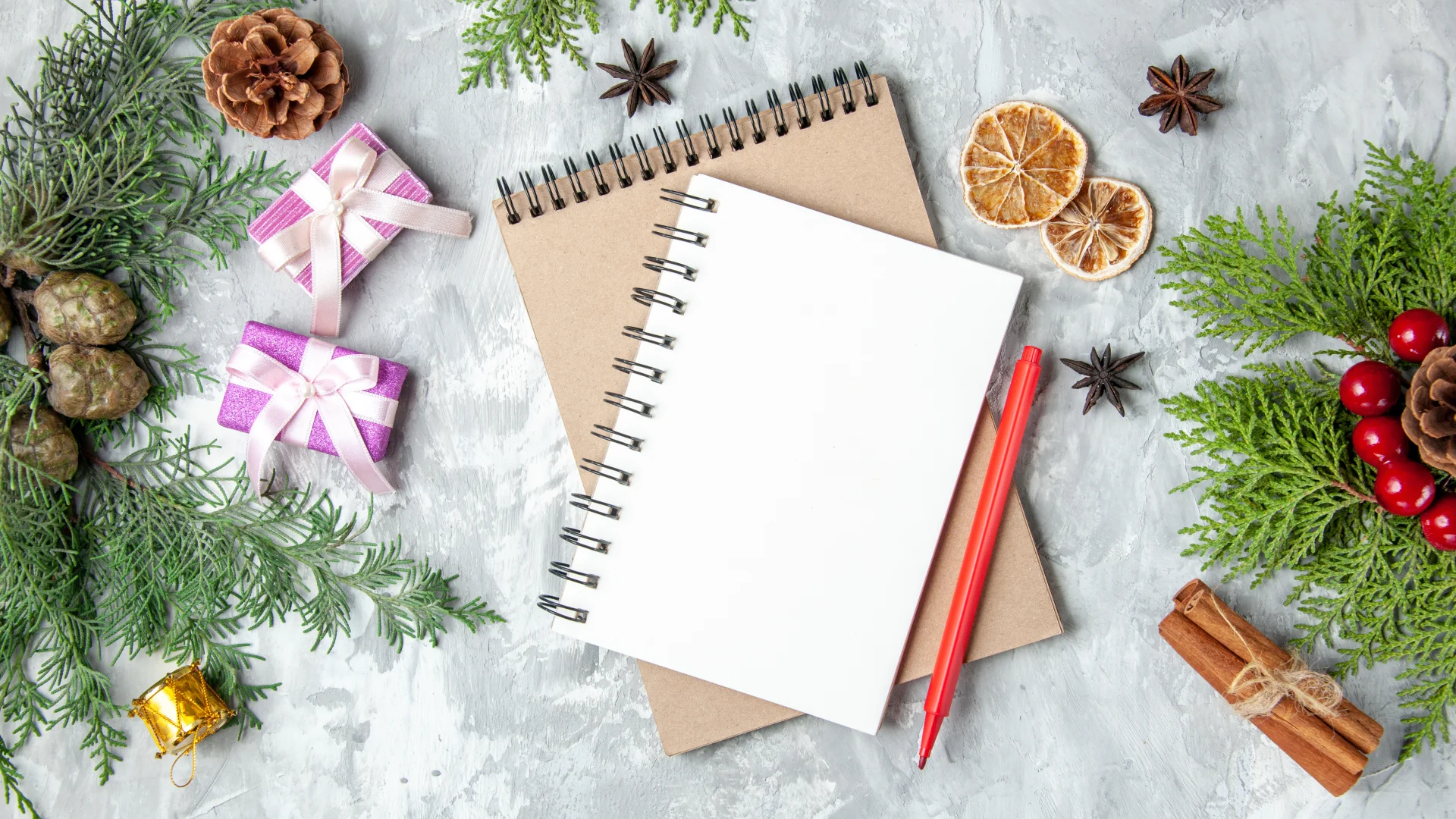 Top View Notebooks Xmas Gifts Pine Tree Branches Cinnamon Sticks Grey Surface